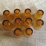 Series of 10 amber glasses