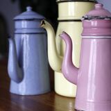 Set of old coffee makers in enamelled sheet metal