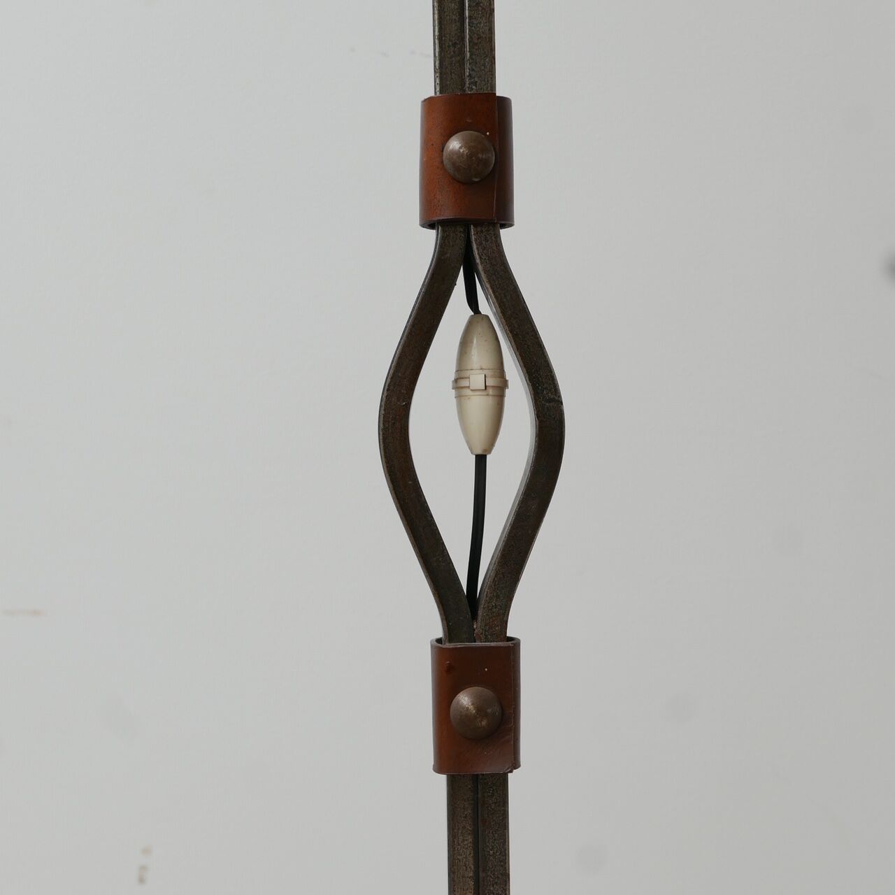 Leather and iron floor lamp by Jean-Pierre Ryckaert