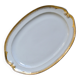 Very large oval dish with gold trim in Limoges porcelain by Peconnet.