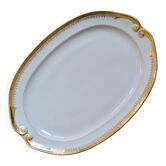 Very large oval dish with gold trim in Limoges porcelain by Peconnet.