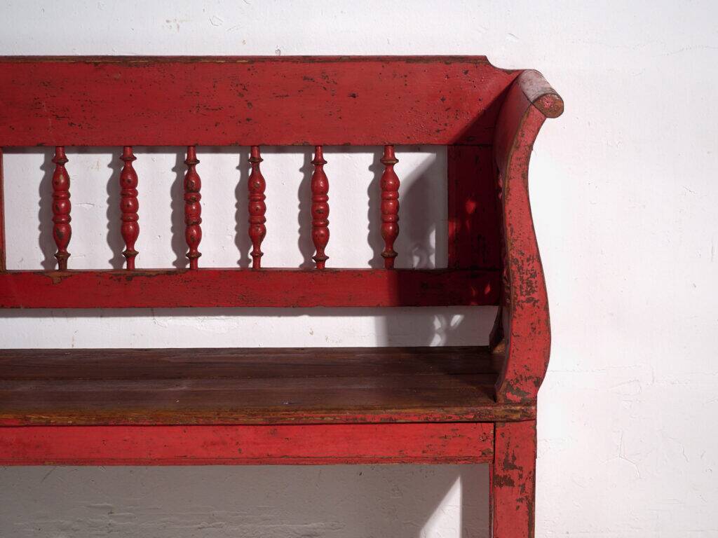 Old red-painted pine bench with turned backrest – Central Europe, circa 1900