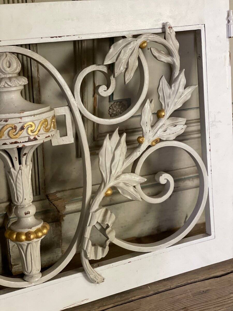 Pair of cast iron window shutters in Louis XVI style.