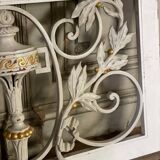 Pair of cast iron window shutters in Louis XVI style.