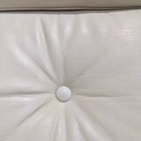 Fauteuil pivotant en cuir patiné gris