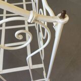 White wrought iron folding bed