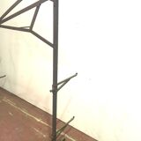 Big in front of hammered iron fireplace