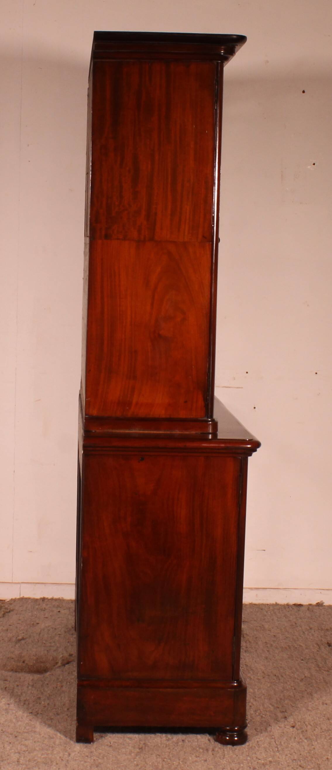 small two-body solid mahogany desk from the early 19th century with writing surface