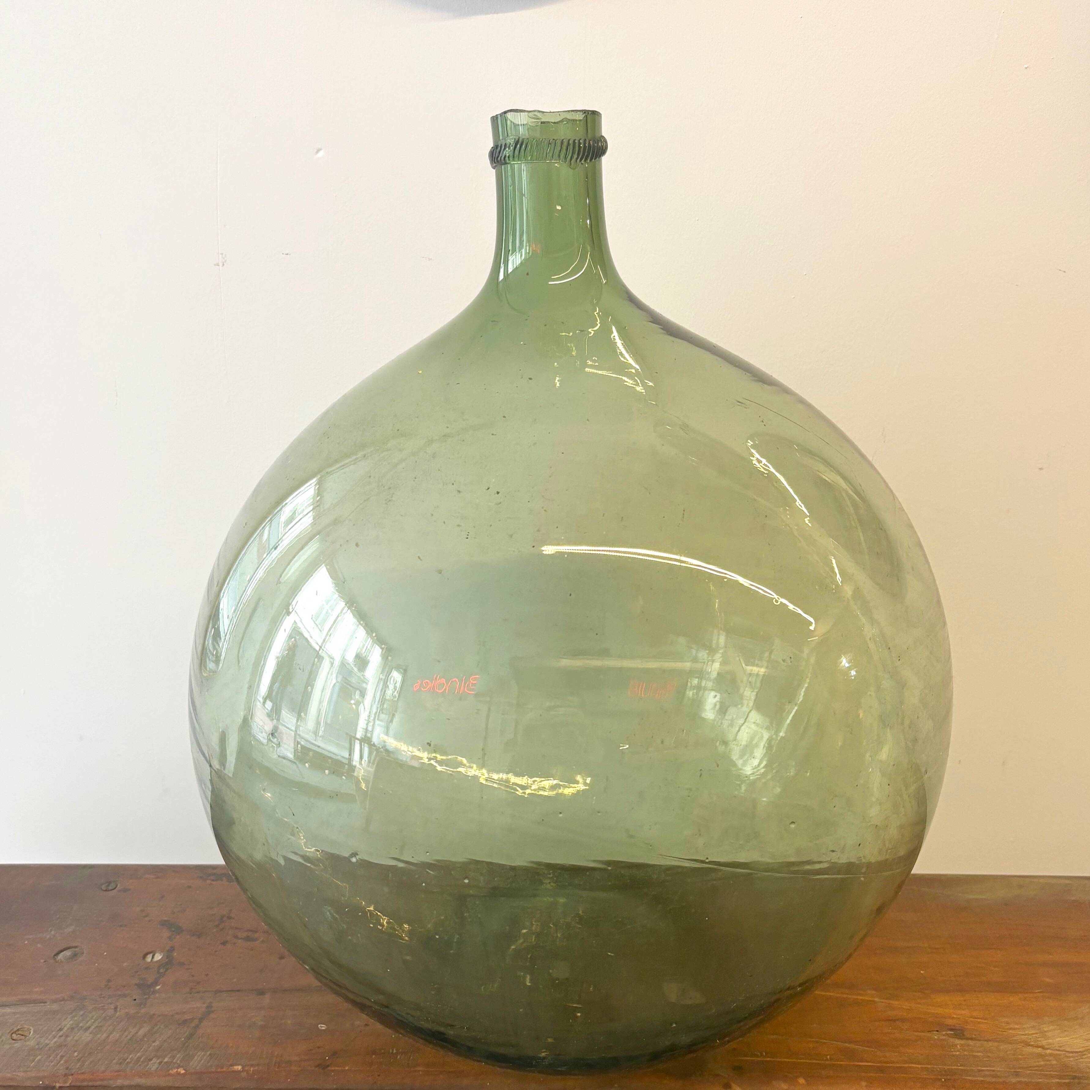 Fat demijohn in old blown glass