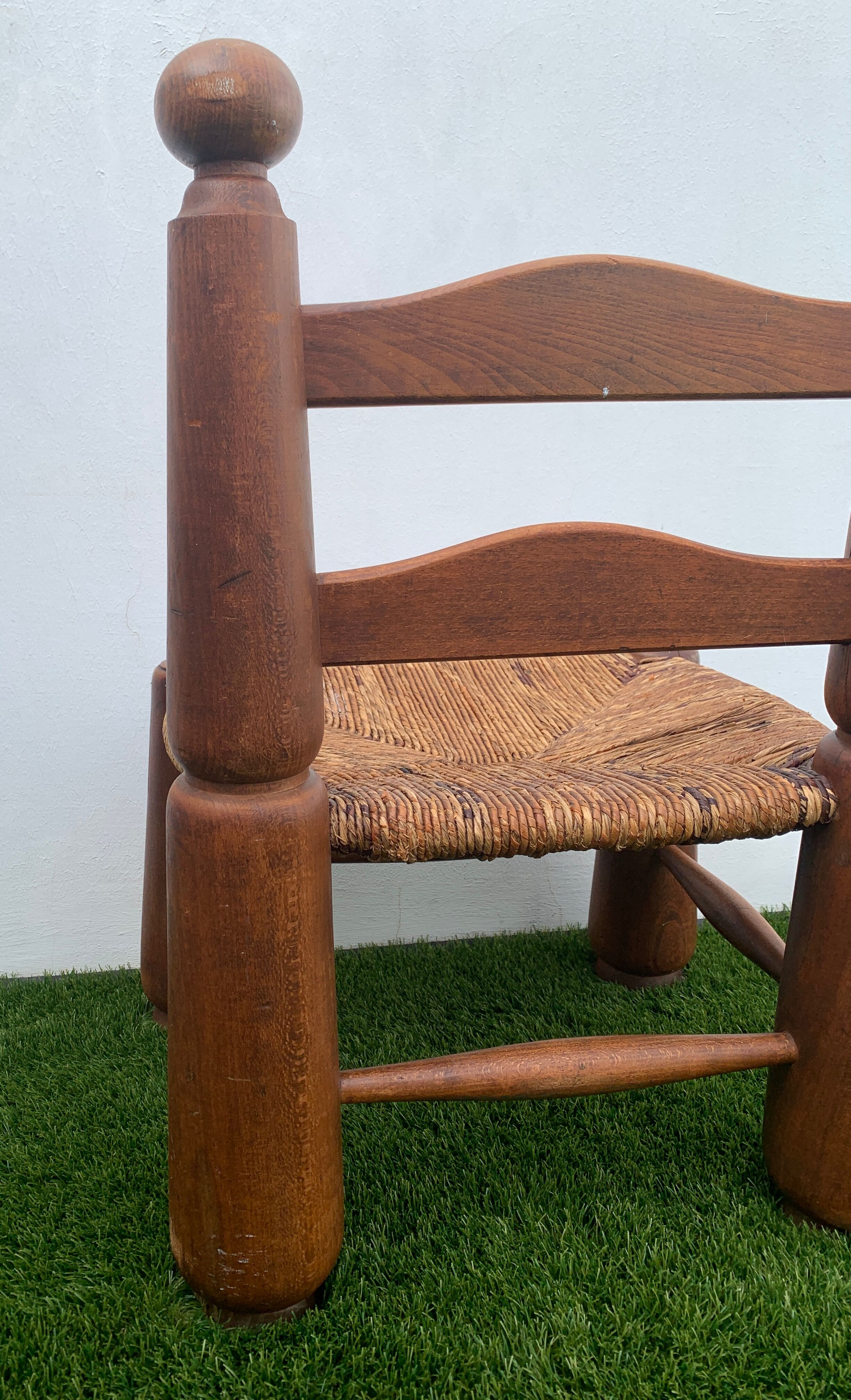 Pair of antique low fire chairs made of wood and straw
