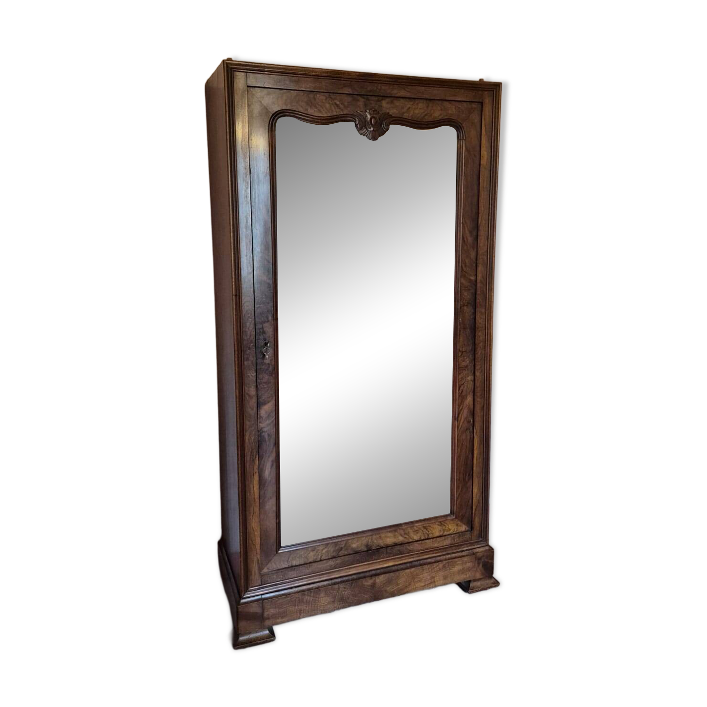 Antique wardrobe with one door and mirror.