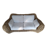 Wicker and rattan sofa with curves