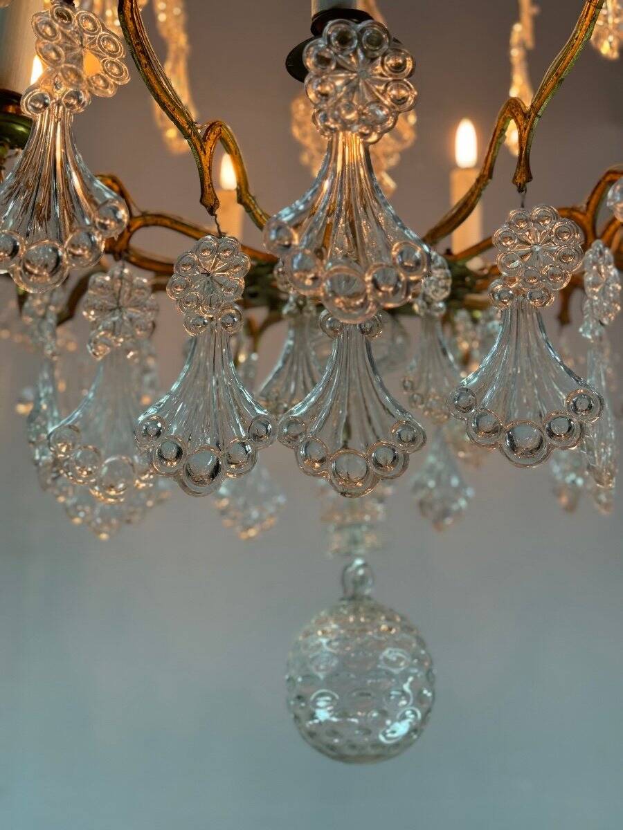 Gilt bronze cage chandelier decorated with glass pendants in the shape of peacock feathers circa 1800