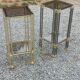 Pair of Hollywood Regency side tables in gold metal and smoked glass.