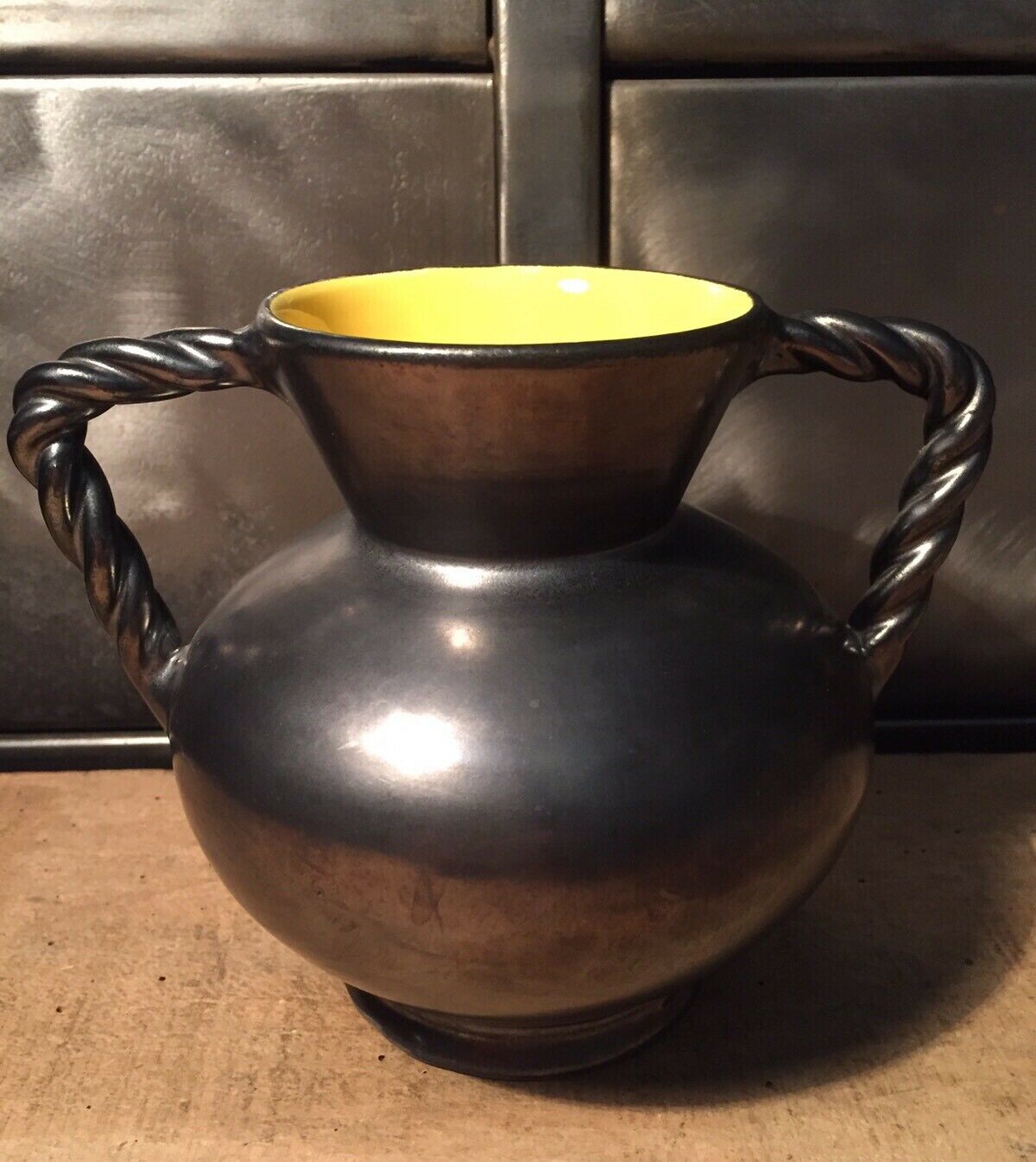Iridescent black and yellow ceramic vase