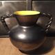Iridescent black and yellow ceramic vase