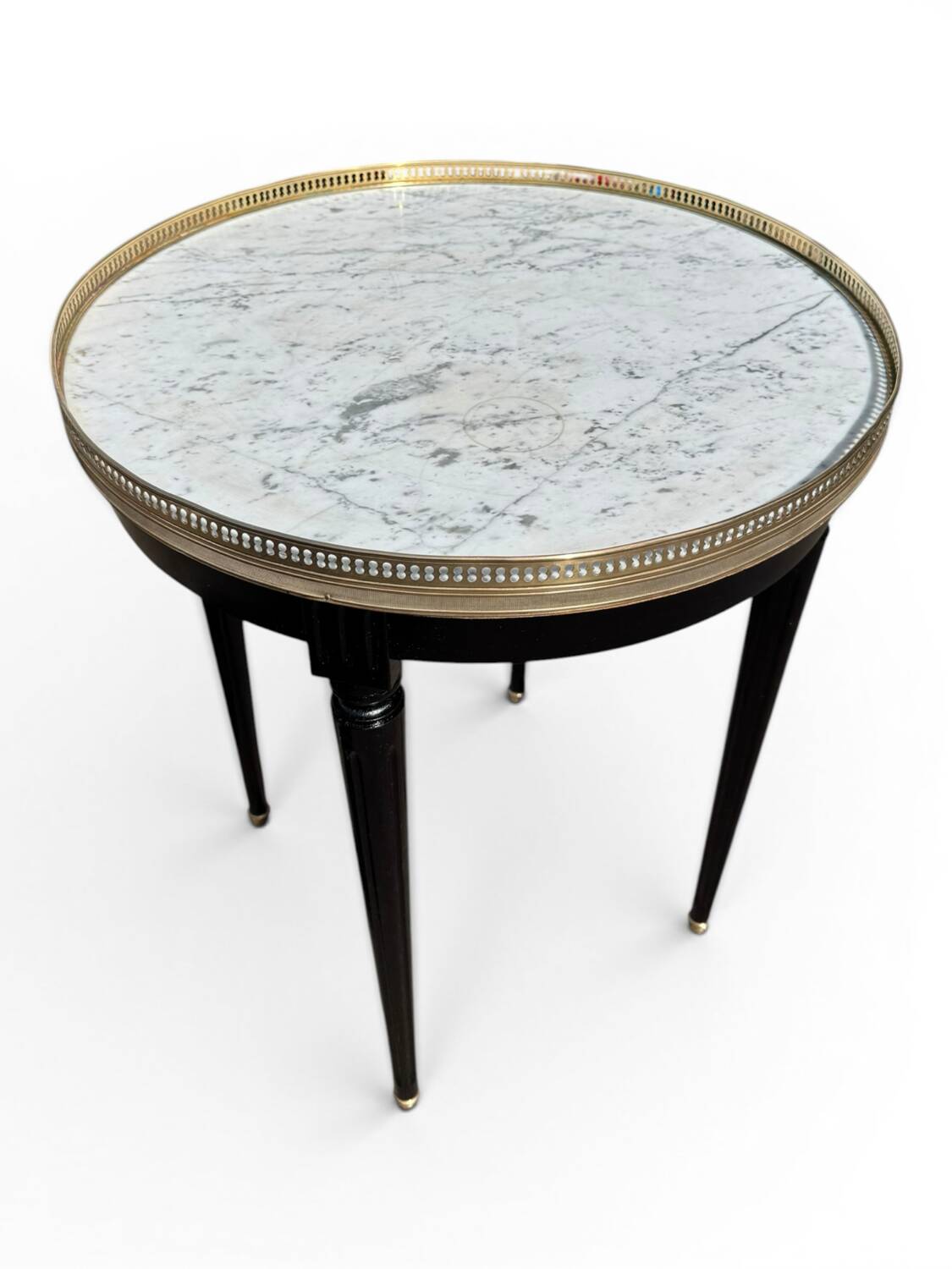 Bouillotte table in Louis XVI style made of blackened wood, marble, and brass.