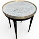 Bouillotte table in Louis XVI style made of blackened wood, marble, and brass.