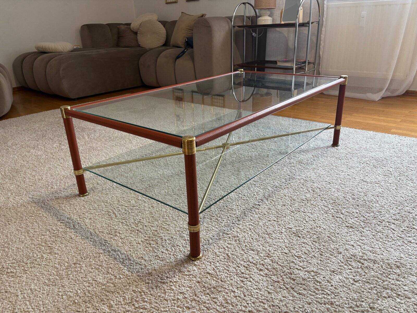 Coffee table in the style of Jacques Adnet, France, 1960s