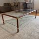 Coffee table in the style of Jacques Adnet, France, 1960s