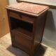 Solid oak bedside table with brown marble.