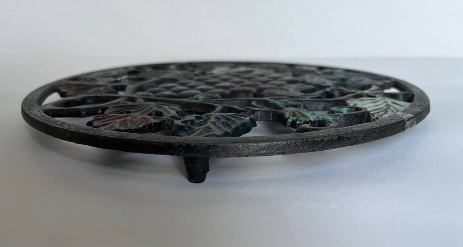 Old cast iron trivet
