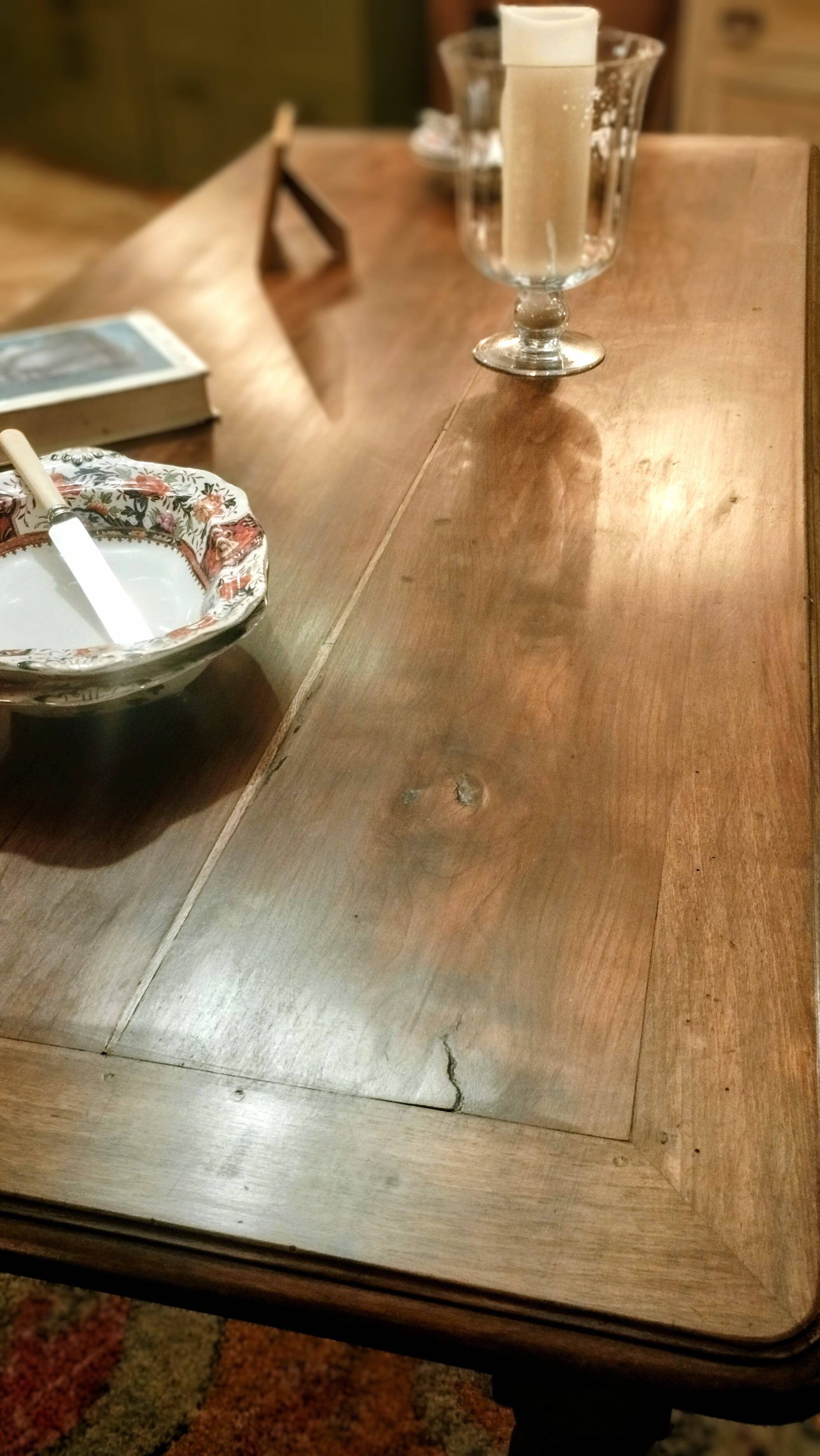 Old French farmhouse table in walnut with turned legs.