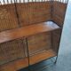 Vintage rattan and metal bar and its stools.