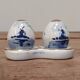 Salt and pepper shaker in Delftware pottery.