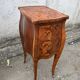 Pair of bedside tables with bombé shape, marquetry, and bronze in Louis XV style.