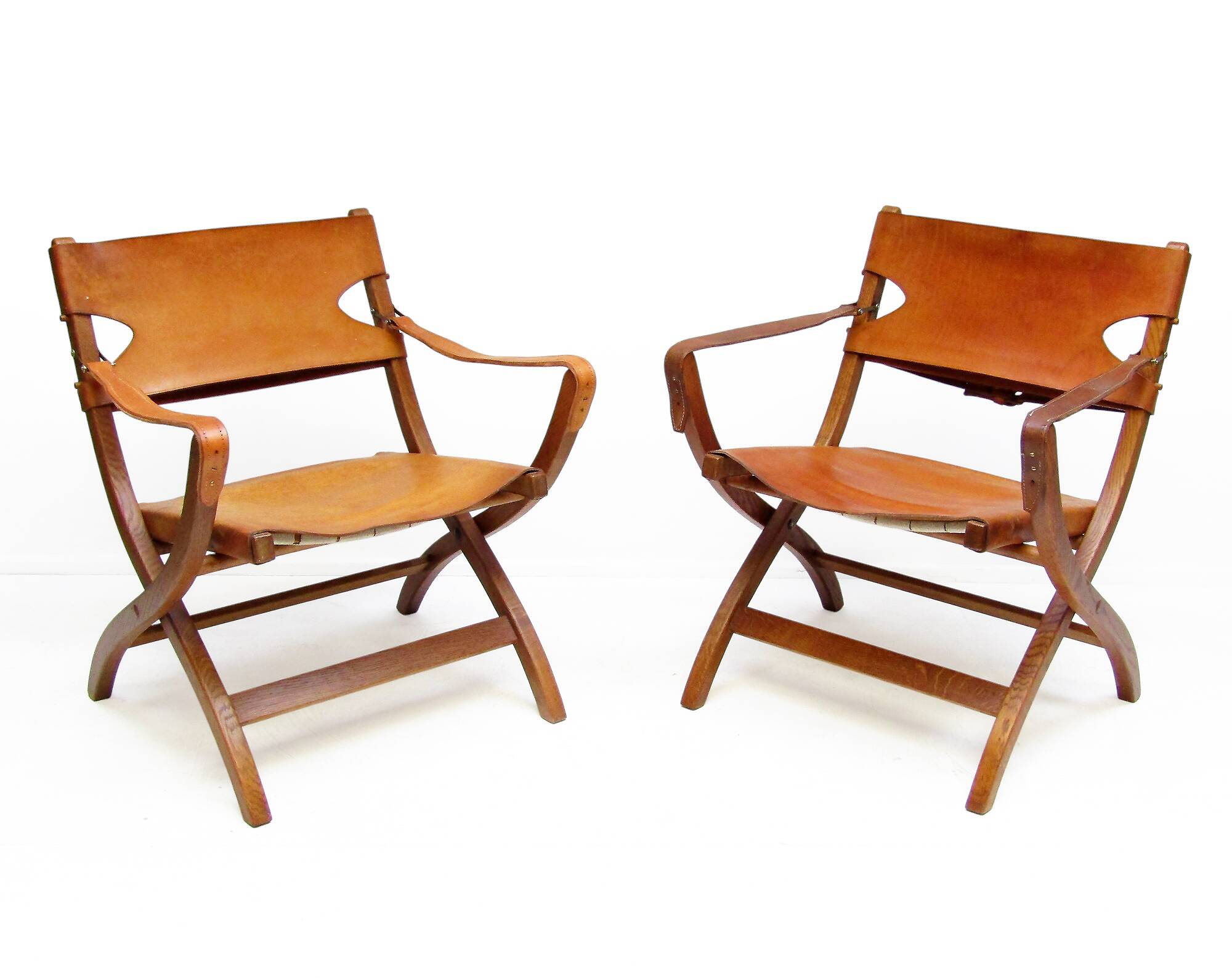 Two 1950s Danish Safari Chairs In Oak & Hide Leather by Poul Hundevad