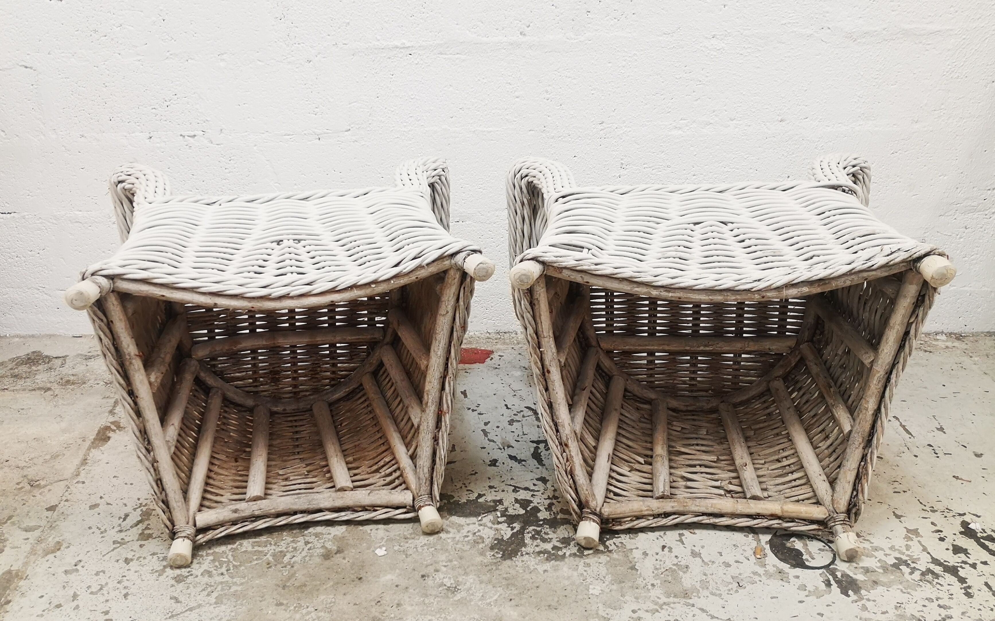 Pair of white rattan armchairs