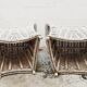 Pair of white rattan armchairs