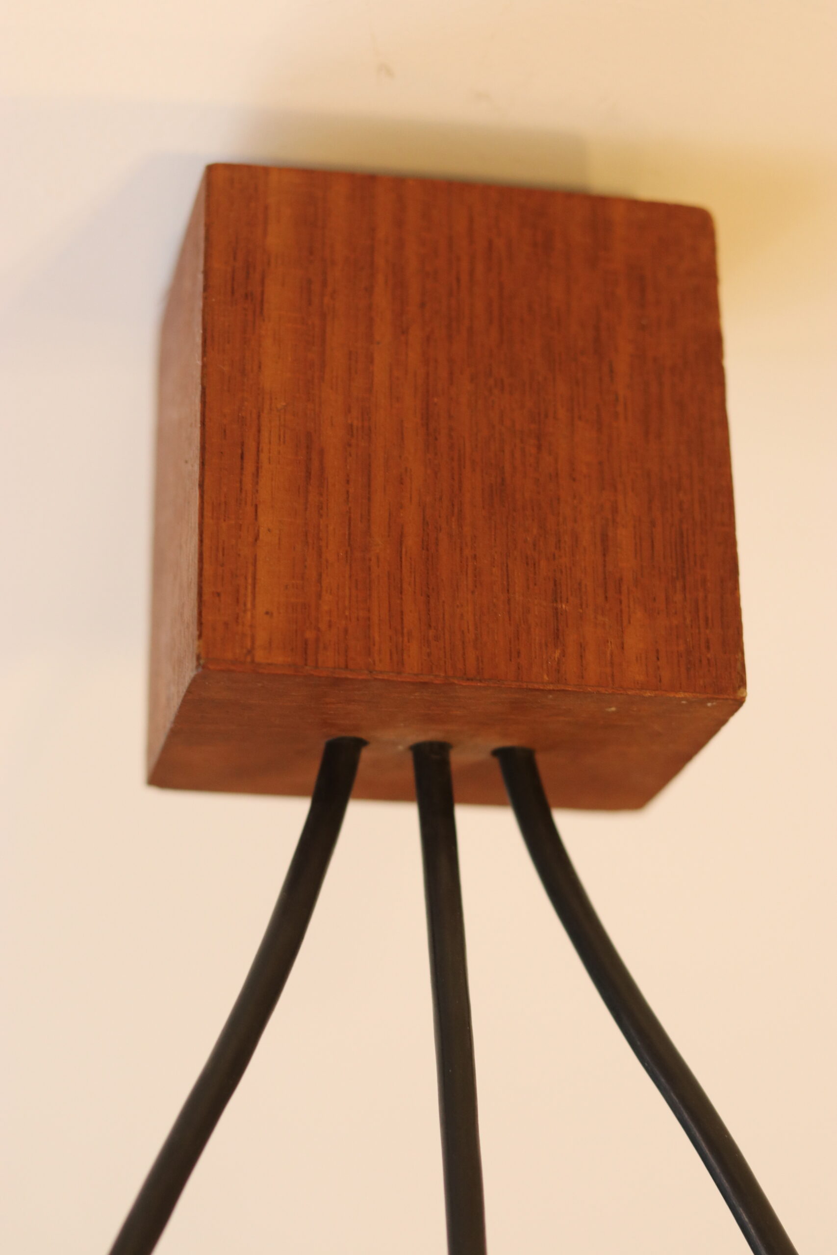 1960s Scandinavian suspension light in teak and perspex.