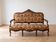 Two-seater banquette canapé in Louis XV style, made of wood and fabric.