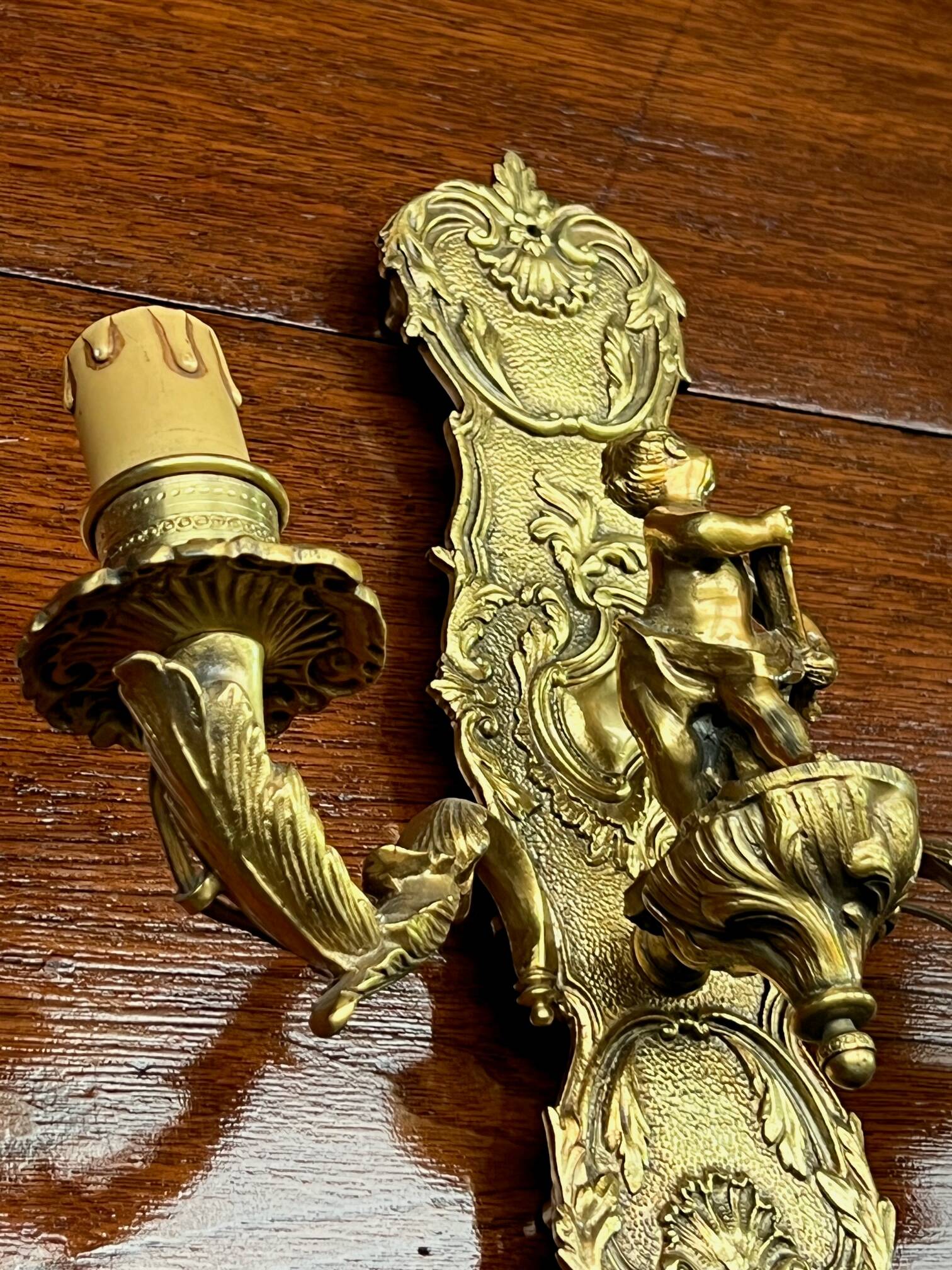 Pair of Louis XV style wall lights. Solid gilded bronze.