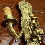 Paire d'appliques de style Louis XV. Bronze massif doré.
