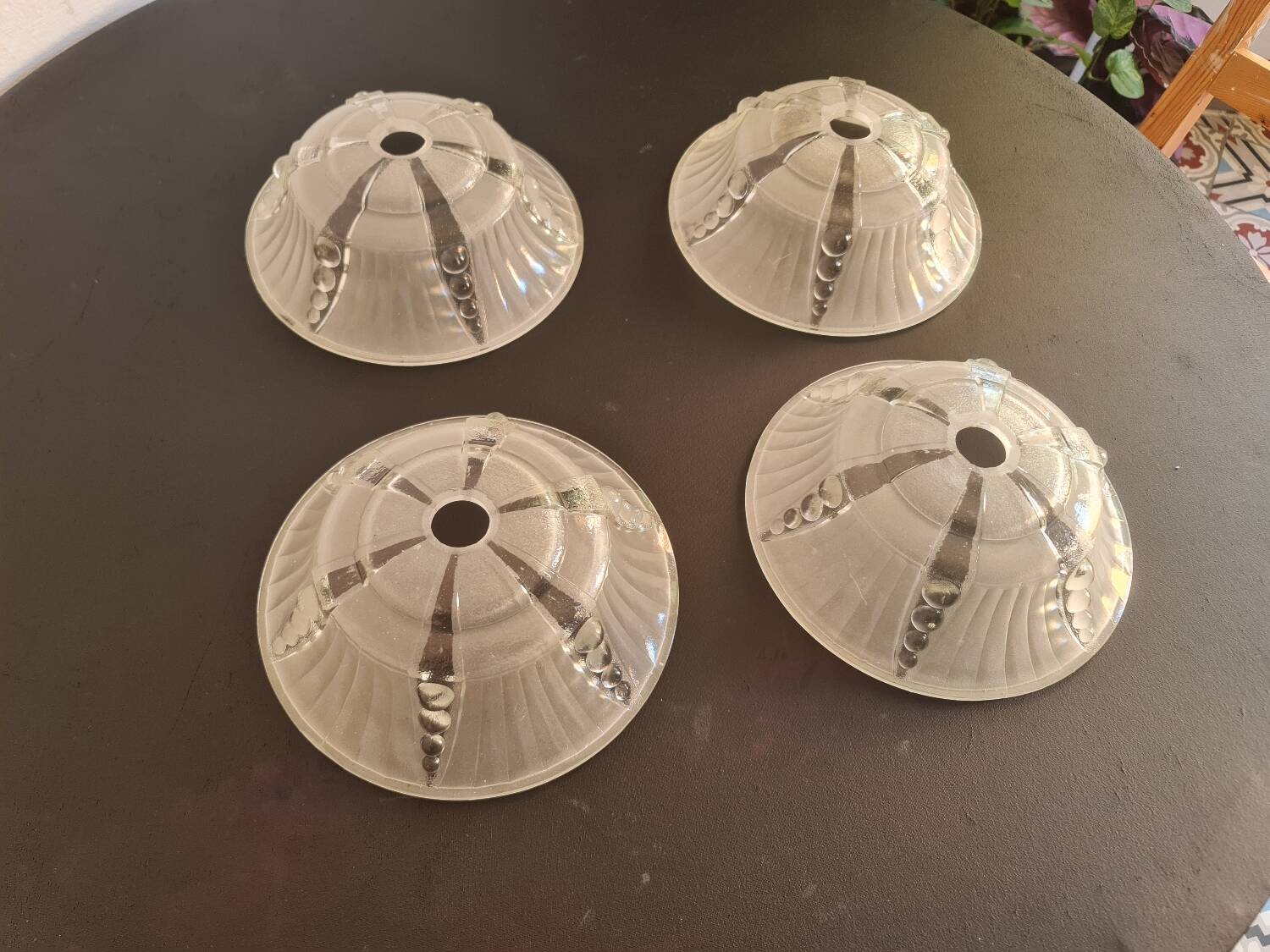 Art Deco wall lights/pendants dating from around 1920.