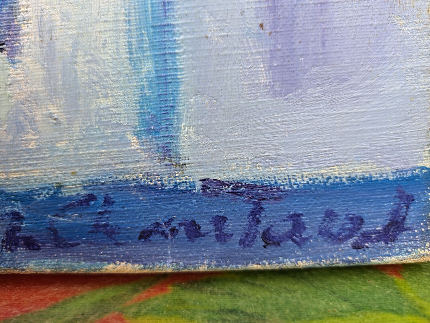 Canvas signed "blue houses"