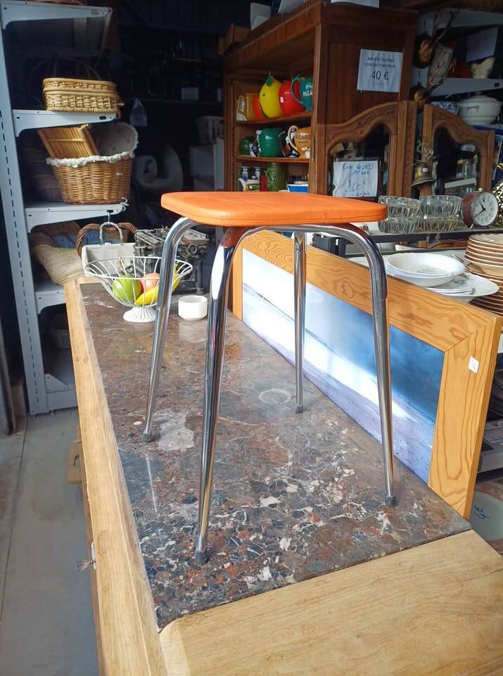 Orange leatherette stool from the 60s/70s