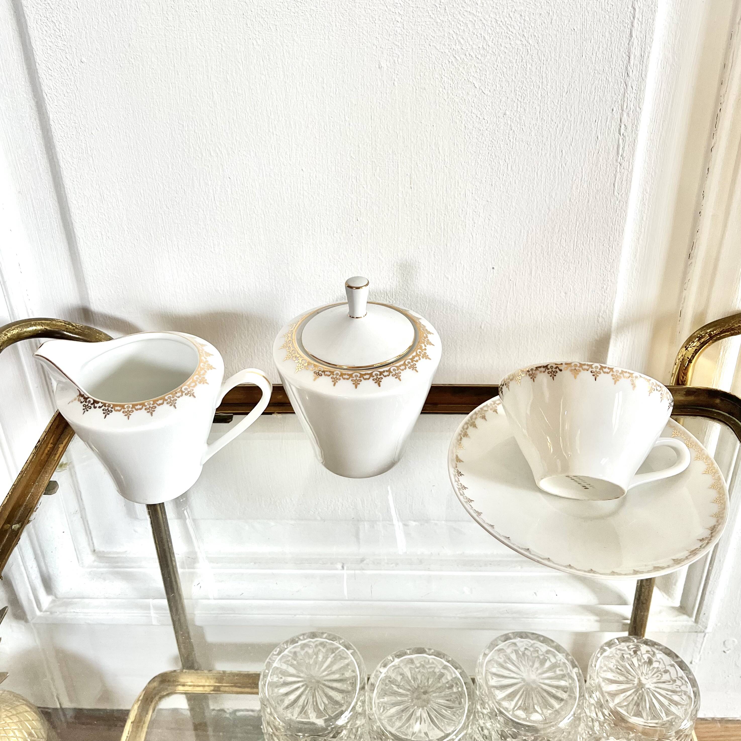 Porcelain sugar bowl and milk jug
