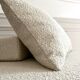 Square ottoman and its cushions in buckle fabric