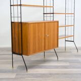 Shelf on feet, black metal ladders, 60s
