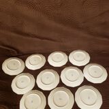 11 porcelain plates 12 sides bordered small flowers