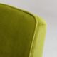 Fauteuil vintage en velours vert poire, bois naturel huilé.