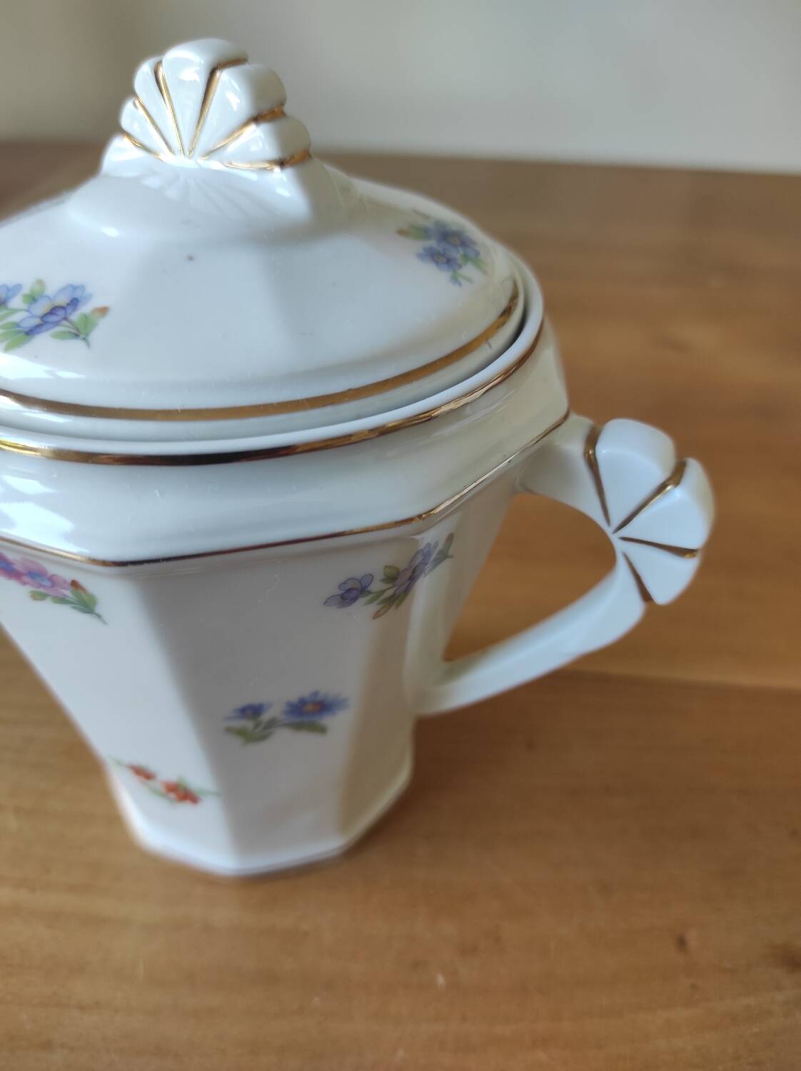 Porcelain sugar bowl with floral decoration