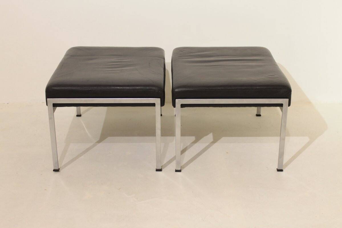 Pair of designer leather and brushed stainless steel footrests - Rob Parry