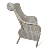 Gray patinated rattan armchair