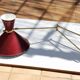 Large Diabolo wall lamp René Mathieu for Lunel burgundy color