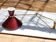 Large Diabolo wall lamp René Mathieu for Lunel burgundy color